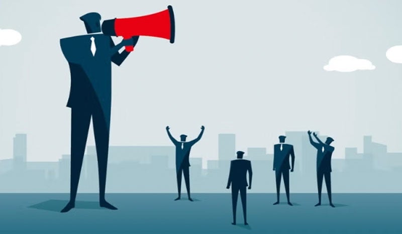 An illustration of a giant person with a megaphone leading a smaller group.